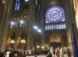 Rayonnant rose window of the north transept (1250s), Primary Gothic tribune windows (before 1190), one Classic Gothic clerestory (c. 1200)