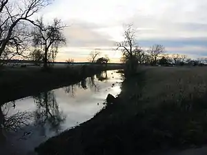 Caney Creek at the FM 457 bridge at sunset