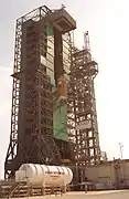 Centaur IIA, to be used to launch TDRS-I, is lifted for integration.