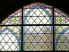 A leadlight church window, Czech Republic, combines  traditional diamond panes with the pale translucent and textured quality of modern so-called "cathedral glass".