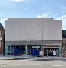 Photo of a modern subway station entrance under construction.