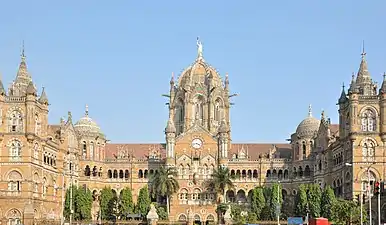 The present building of the Chhatrapati Shivaji Terminus was designed by Frederick William Stevens in the Victorian Gothic style and completed in 1888.