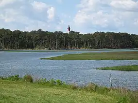 Assateague Channel with Assateague Light in distance