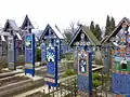 The Merry Cemetery crosses in pale blue color