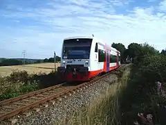 A Stadler Regio-Shuttle RS1 unit along Stollberg–St. Egidien railway line. (August 2012)