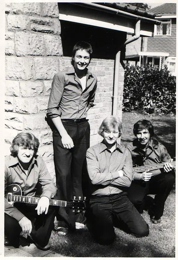 Parker (standing) in 1975