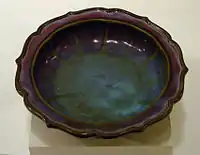 A Jin or Yuan dynasty "Official Jun ware" stoneware dish, 13th–14th century