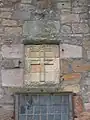 An ornate carved cross on the 17th century transept.