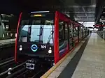 B07 stock train at Heron Quays DLR station