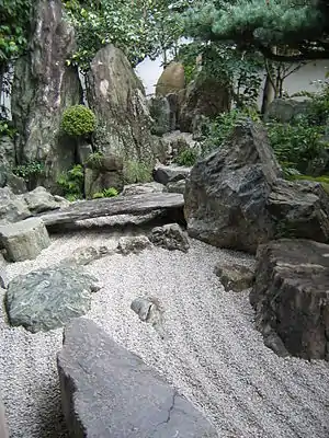 Japanese rock garden, A mountain, waterfall, and gravel "river" at Daisen-in (1509–1513)