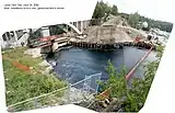 Images indicate snow fence erected to prevent kayaks and rafts from intentionally descending the chute of the dam as had been past practice