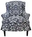 Damask slipcovered wing chair