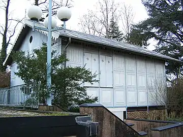 The "Iron House", a prefabricated galvanized steel house designed by Gustave Eiffel, used as a ticket booth in the exposition, now a park shelter in Dampierre