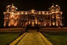 The building illuminated at night