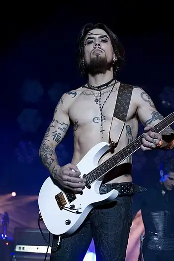 Navarro playing guitar