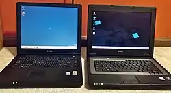 Dell Inspiron1300 next to a Inspiron 2200, running Windows 7