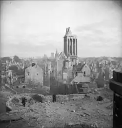 A scenic cityscape showing destroyed and badly-damaged buildings