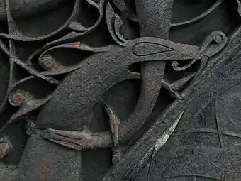 Detail of carving on left jamb of north door