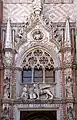 Shouldered arch above the main entrance of Doge's Palace in Venice. The vertical supports separate the segments of an ogee arch.