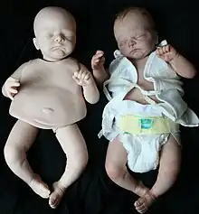 Before and after image of a doll sculpted out of clay, reproduced into a vinyl kit and reborned