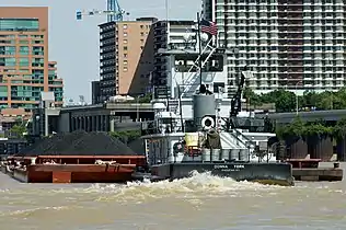 Towboat Donna York pushing barges of coal up the Ohio River at Louisville, Kentucky, United States