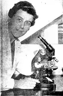 Woman using a microscope