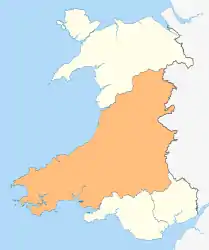 A map of Wales in yellow with a large area in green (about 60%) from the right (east) to the bottom left (south west)