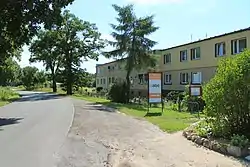 Buildings by the road in Dziećmiarki