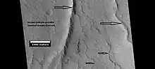 Possible inverted stream channels in Phlegra Dorsa region, as seen by HiRISE under HiWish program. The ridges were probably once stream valleys that have become full of sediment and cemented.  So, they became hardened against erosion which removed surrounding material.