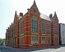 Large ornate red-bricked building