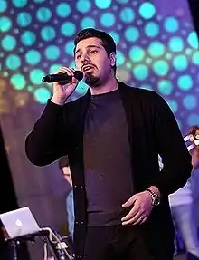 Amiri during a concert in Milad Tower (February 2015)