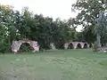 Arched stone fence