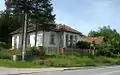 The building with Elizabeth Milbank name written in Cyrillic, located in Slovac, Serbia.