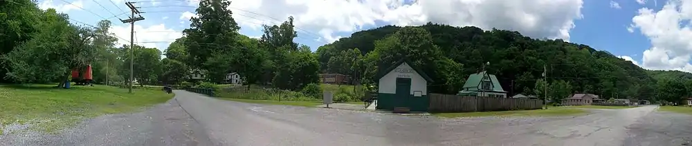 Visible beyond the bridge is the John J. Lincoln House