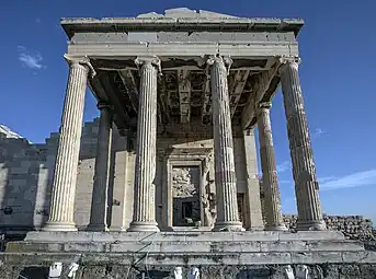 Ancient Greek Ionic columns of the Erechtheion, Greece, with paralel volutes, unknown architect, 421-405 BC