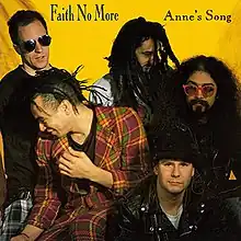 Cover artwork featuring a photograph of the band