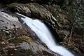 A small waterfall visible from the trail