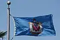 The flag flying outside Victoria's City Hall.  This example incorrectly reverses the red and the blue in the shield of the coat of arms.