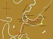 Site of the encounter near Greenwood, Mississippi. The Tallahatchie flows from the north in a tortuous path; near its lower end it is flowing almost due east, to the point where it meets the Yalobusha. The two rivers form the Yazoo, which soon turns west and flows past the Tallahatchie about three miles (5 kilometers) downstream. Fort Pemberton is set up at the point where the two rivers are closest. Other Confederate works line the right (south) bank of the Tallahatchie. The Union fleet is arrayed in the Tallahatchie upstream from Fort Pemberton, the ironclads in front about a half mile (700 meters) away.