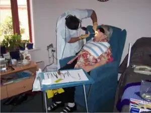 Geriatric patient receiving dental care