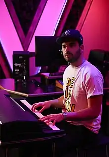 A man playing keyboards