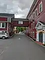 The bridge connecting the main inn (left) to the Depot Street building, looking back to Main Street from the inn's parking lot