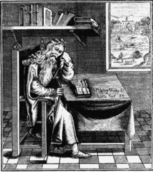 A man sits on a large ornate chair, resting his left elbow on a desk, his clenched fist supporting his head. In his right hand, at his waist, he holds a walking cane. He wears a cloak and a long beard, and his slippered feet rest on a chequered or tiled floor.  On the desk lies an open book.  Above his head the wall contains a shelf, filled with books.  A picture hangs from the wall showing a country scene with a large mansion or castle