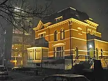 Office building illuminated by high-pressure sodium lamps