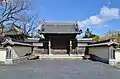 Modern gate with Foundation Stones of the Kondō