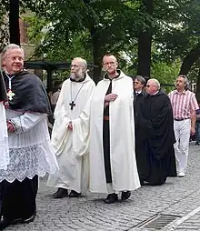 Procession of the Holy Blood in Bruges: abbott Van Hecke (second to the left) with one of his monks