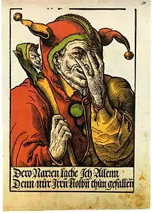 A jester shown with a marotte in a 1540 woodcut by Heinrich Vogtherr the Younger