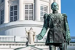 Close-up from the front with Helsinki Cathedral's John the Apostle in the background