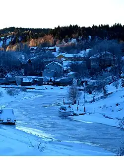 View of the Herre river running through the village