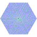 Hexagonal number spiral with prime numbers in green and more highly composite numbers in darker shades of blue.